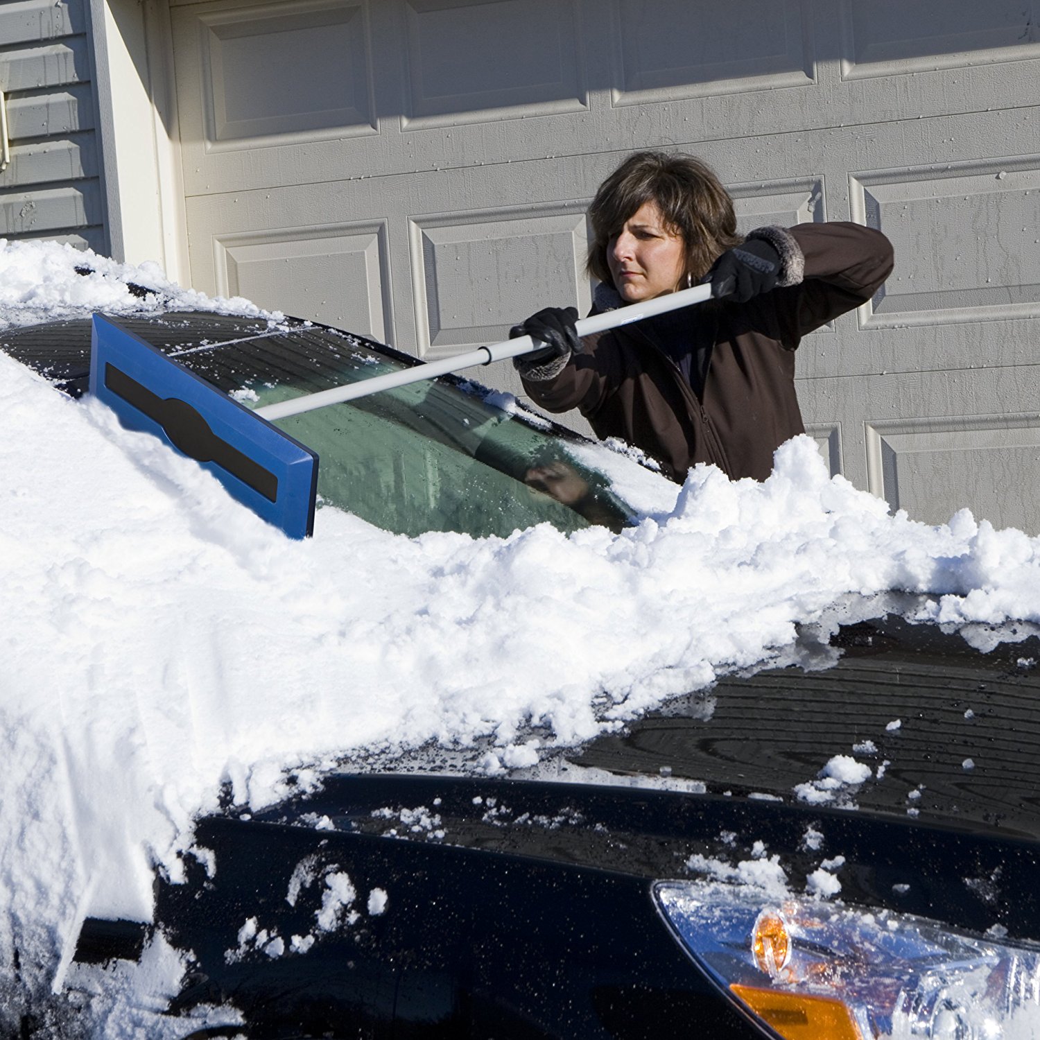 snow broom for easy snow removal on a car, truck or suv