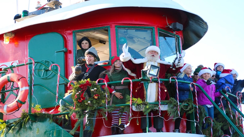 Santa Arrives by Tugboat & Lighted Boat Parade at Mystic River Park