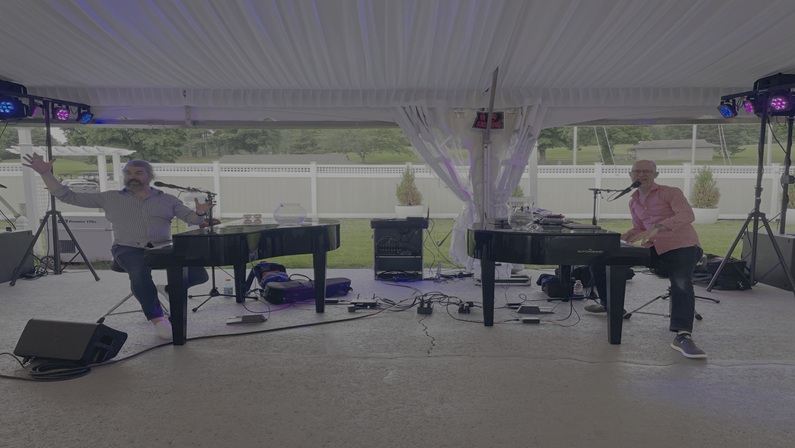 Dueling Pianos Under the Golf Tent at 1741 Pub & Grill